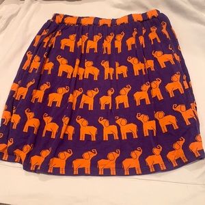 Adorable purple skirt with orange elephants